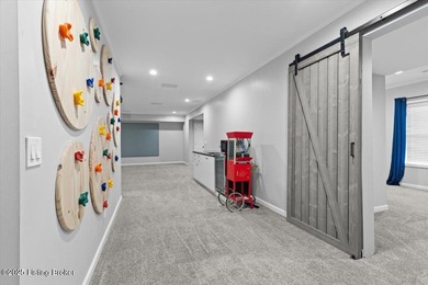 Imagine waking up, coffee in hand on your covered back deck on Eagle Creek Golf Course in Kentucky - for sale on GolfHomes.com, golf home, golf lot