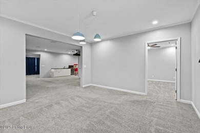 Imagine waking up, coffee in hand on your covered back deck on Eagle Creek Golf Course in Kentucky - for sale on GolfHomes.com, golf home, golf lot