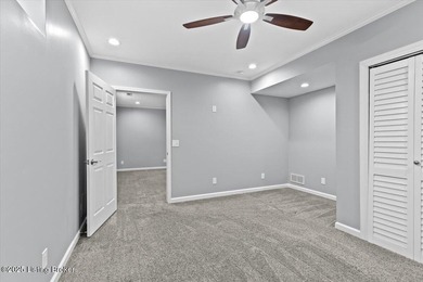 Imagine waking up, coffee in hand on your covered back deck on Eagle Creek Golf Course in Kentucky - for sale on GolfHomes.com, golf home, golf lot