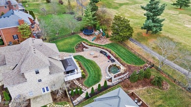 Imagine waking up, coffee in hand on your covered back deck on Eagle Creek Golf Course in Kentucky - for sale on GolfHomes.com, golf home, golf lot