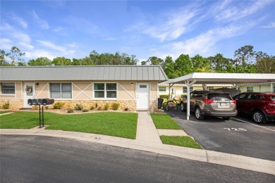 55+ Community ~ Adorable 1 bedroom, 1 bath & 1 carport condo on Summertree Golf Course in Florida - for sale on GolfHomes.com, golf home, golf lot