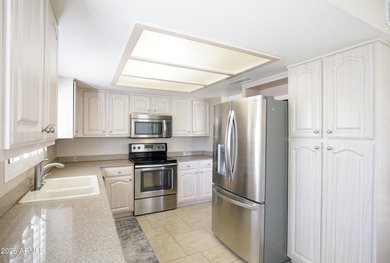 Enjoy resort-style living in this charming 2-bedroom, 2-bath on Westbrook Village Golf Club in Arizona - for sale on GolfHomes.com, golf home, golf lot