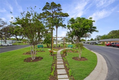 55+ Community ~ Adorable 1 bedroom, 1 bath & 1 carport condo on Summertree Golf Course in Florida - for sale on GolfHomes.com, golf home, golf lot