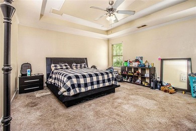 4% Rate Assumable FHA with Roam! Do not miss this 4-bedroom on Southwind Golf Club in Georgia - for sale on GolfHomes.com, golf home, golf lot