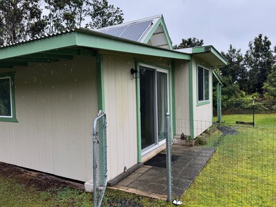 This well-built and thoughtfully designed 476 sq ft studio on Volcano Golf and Country Club in Hawaii - for sale on GolfHomes.com, golf home, golf lot