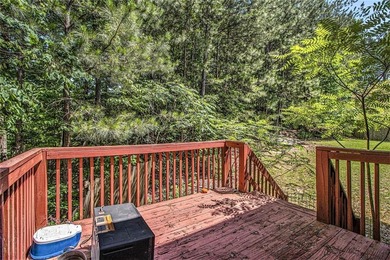 4% Rate Assumable FHA with Roam! Do not miss this 4-bedroom on Southwind Golf Club in Georgia - for sale on GolfHomes.com, golf home, golf lot