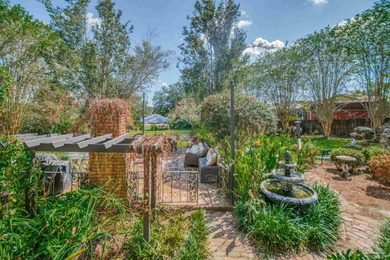 You have found your forever home! This old-world charming house on Scenic Hills Country Club in Florida - for sale on GolfHomes.com, golf home, golf lot