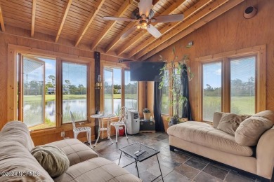 Beautifully updated and spacious END unit featuring a detached on Olde Point Golf and Country Club in North Carolina - for sale on GolfHomes.com, golf home, golf lot