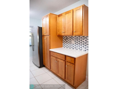 Recently updated, this first-floor condominium is situated in an on Delaire Golf and Country Club in Florida - for sale on GolfHomes.com, golf home, golf lot