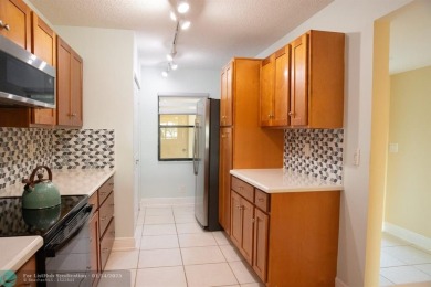 Recently updated, this first-floor condominium is situated in an on Delaire Golf and Country Club in Florida - for sale on GolfHomes.com, golf home, golf lot