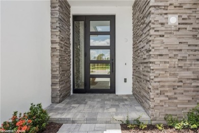 Introducing the exquisite custom Costa Rio, a masterpiece of on Miromar Lakes Golf Club in Florida - for sale on GolfHomes.com, golf home, golf lot