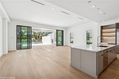Introducing the exquisite custom Costa Rio, a masterpiece of on Miromar Lakes Golf Club in Florida - for sale on GolfHomes.com, golf home, golf lot