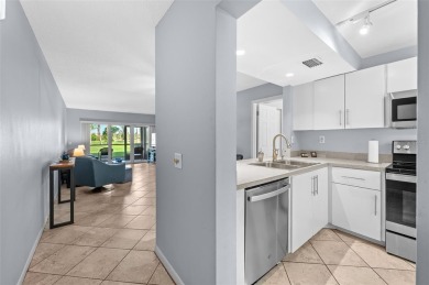 Live the Island Life! 2 Bedroom, 2 Bath condo with many updates on Isla Del Sol Yacht and Country Club in Florida - for sale on GolfHomes.com, golf home, golf lot
