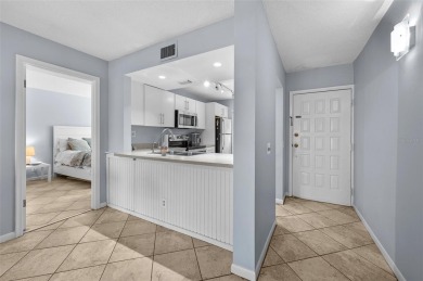 Live the Island Life! 2 Bedroom, 2 Bath condo with many updates on Isla Del Sol Yacht and Country Club in Florida - for sale on GolfHomes.com, golf home, golf lot