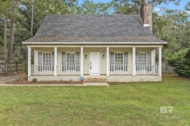 INVESTOR SPECIAL! This delightful Creole-style residence offers on Lake Forest Yacht and Country Club in Alabama - for sale on GolfHomes.com, golf home, golf lot