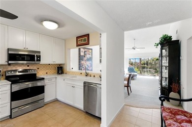 Rarely Available Top-Floor End Unit with Stunning Lake & Golf on Royal Wood Golf and Country Club in Florida - for sale on GolfHomes.com, golf home, golf lot