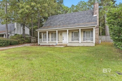 INVESTOR SPECIAL! This delightful Creole-style residence offers on Lake Forest Yacht and Country Club in Alabama - for sale on GolfHomes.com, golf home, golf lot