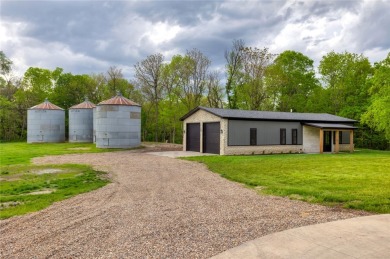 Welcome to Creekside Hideaway, a breathtaking 3-acre executive on Beaver Creek Golf Course in Iowa - for sale on GolfHomes.com, golf home, golf lot