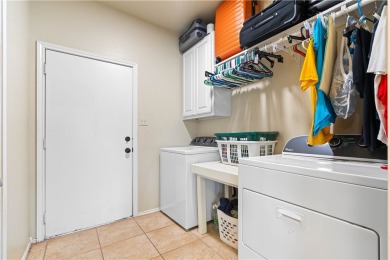 Welcome to this charming home on the 6th Fairway, in the sought on Rockport Country Club in Texas - for sale on GolfHomes.com, golf home, golf lot