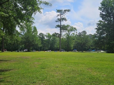 Gorgeous .56 acre level building lot in Wyboo Plantation, a on Players Course At Wyboo Plantation in South Carolina - for sale on GolfHomes.com, golf home, golf lot