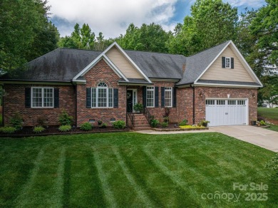Step into this truly impeccably maintained Westport home and you on Westport Golf Club in North Carolina - for sale on GolfHomes.com, golf home, golf lot