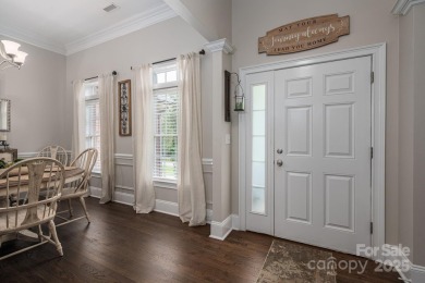 Step into this truly impeccably maintained Westport home and you on Westport Golf Club in North Carolina - for sale on GolfHomes.com, golf home, golf lot