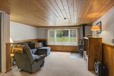 Welcome to this beautiful Colonial-style home located in the on Indian River Golf Club in Michigan - for sale on GolfHomes.com, golf home, golf lot