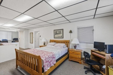Welcome to this beautiful Colonial-style home located in the on Indian River Golf Club in Michigan - for sale on GolfHomes.com, golf home, golf lot
