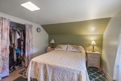 Welcome to this beautiful Colonial-style home located in the on Indian River Golf Club in Michigan - for sale on GolfHomes.com, golf home, golf lot
