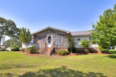 Immaculate 3BR, 2BA Lake Marion waterfront home with spectacular on Players Course At Wyboo Plantation in South Carolina - for sale on GolfHomes.com, golf home, golf lot