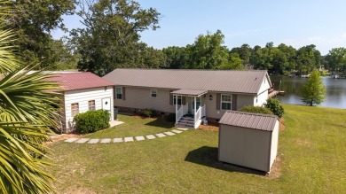 Immaculate 3BR, 2BA Lake Marion waterfront home with spectacular on Players Course At Wyboo Plantation in South Carolina - for sale on GolfHomes.com, golf home, golf lot