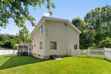 Nestled on a peaceful cul-de-sac and set on a flat quarter acre on E. Gaynor Brennan Municipal Golf Course in Connecticut - for sale on GolfHomes.com, golf home, golf lot