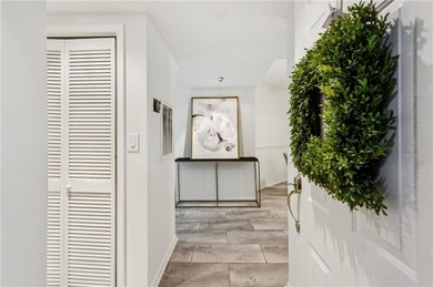 Experience city living at its best in this beautifully on Bobby Jones Golf Club in Georgia - for sale on GolfHomes.com, golf home, golf lot