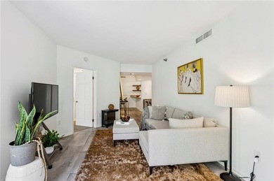 Experience city living at its best in this beautifully on Bobby Jones Golf Club in Georgia - for sale on GolfHomes.com, golf home, golf lot