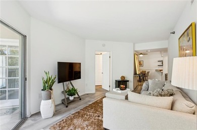 Experience city living at its best in this beautifully on Bobby Jones Golf Club in Georgia - for sale on GolfHomes.com, golf home, golf lot