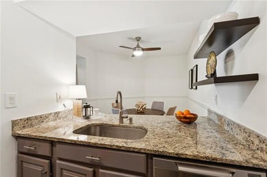 Experience city living at its best in this beautifully on Bobby Jones Golf Club in Georgia - for sale on GolfHomes.com, golf home, golf lot