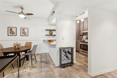 Experience city living at its best in this beautifully on Bobby Jones Golf Club in Georgia - for sale on GolfHomes.com, golf home, golf lot