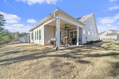 This 4-bedroom, 3-bathroom home offers refined living in the on Harbor Club Golf and Country Club in Georgia - for sale on GolfHomes.com, golf home, golf lot