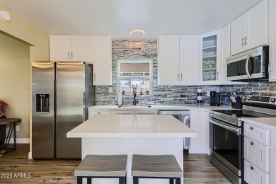 Welcome to your next adventure in comfort, convenience, and on Villa De Paz Golf Course in Arizona - for sale on GolfHomes.com, golf home, golf lot