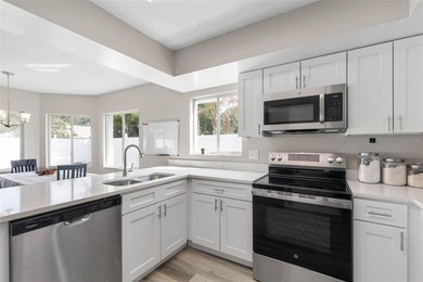 Welcome to your Pine Lakes Paradise! Tucked away on a tranquil on The Grand Club - Pine Lakes Course in Florida - for sale on GolfHomes.com, golf home, golf lot