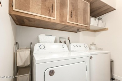 Don't miss this adorable 2-bedroom mobile home in Apache Wells! on Apache Wells Country Club in Arizona - for sale on GolfHomes.com, golf home, golf lot