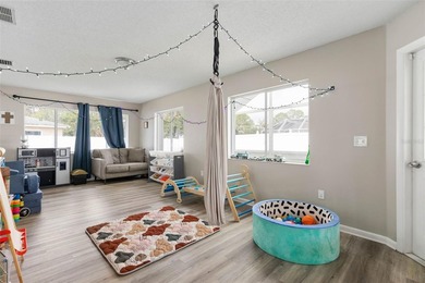 Welcome to your Pine Lakes Paradise! Tucked away on a tranquil on The Grand Club - Pine Lakes Course in Florida - for sale on GolfHomes.com, golf home, golf lot