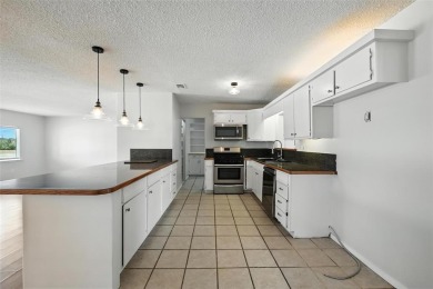 Welcome to 236 Half Moon Way in scenic Runaway Bay--a spacious on The Club At Runaway Bay in Texas - for sale on GolfHomes.com, golf home, golf lot
