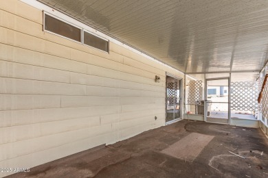 Don't miss this adorable 2-bedroom mobile home in Apache Wells! on Apache Wells Country Club in Arizona - for sale on GolfHomes.com, golf home, golf lot