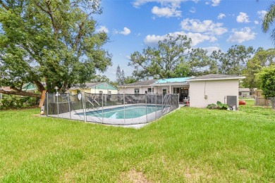 4 bedrooms + den and 2 bathroom POOL home, centrally located in on Babe Zaharias Golf Course in Florida - for sale on GolfHomes.com, golf home, golf lot