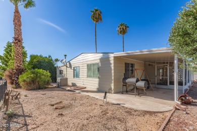 Don't miss this adorable 2-bedroom mobile home in Apache Wells! on Apache Wells Country Club in Arizona - for sale on GolfHomes.com, golf home, golf lot