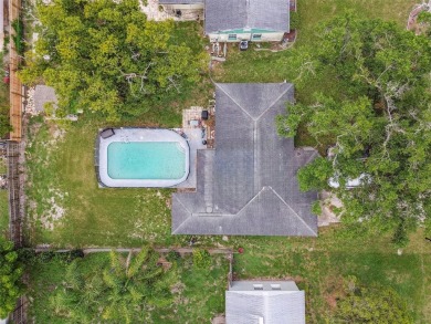 4 bedrooms + den and 2 bathroom POOL home, centrally located in on Babe Zaharias Golf Course in Florida - for sale on GolfHomes.com, golf home, golf lot