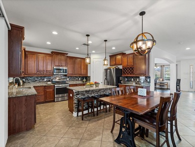 Welcome to this spacious 5 bedroom 4 bath home that sits on a on Diamond Hill Golf and Country Club in Florida - for sale on GolfHomes.com, golf home, golf lot