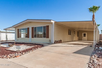 Don't miss this adorable 2-bedroom mobile home in Apache Wells! on Apache Wells Country Club in Arizona - for sale on GolfHomes.com, golf home, golf lot