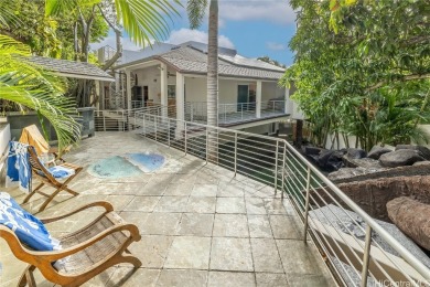 Nestled at the back of a quiet cul-de-sac with majestic banyan on Mid Pacific Country Club in Hawaii - for sale on GolfHomes.com, golf home, golf lot